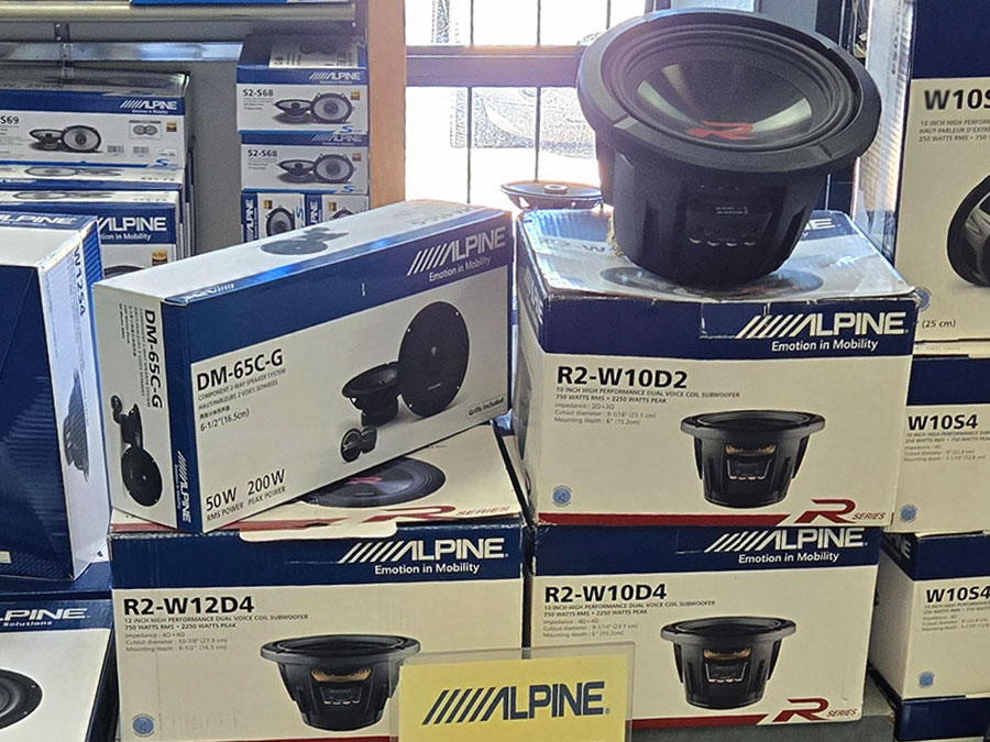 Alpine R-Series R2-W10D2, R2-W10D4 and R2-W12D4 subwoofers with Alpine car speakers on display at Sounds Good To Me in Tempe, AZ