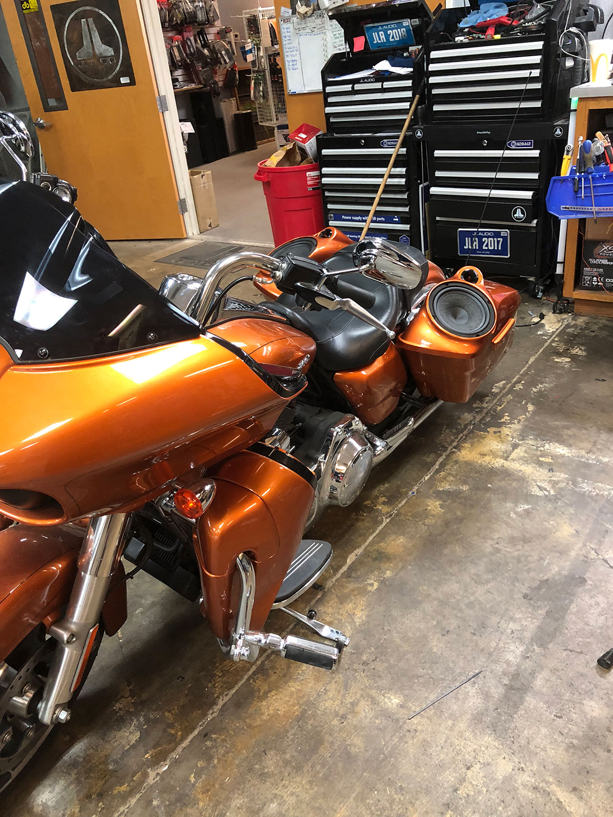Side profile of Harley bagger with integrated custom audio system and paint-matched components Side profile of Harley bagger with integrated custom audio system and paint-matched components