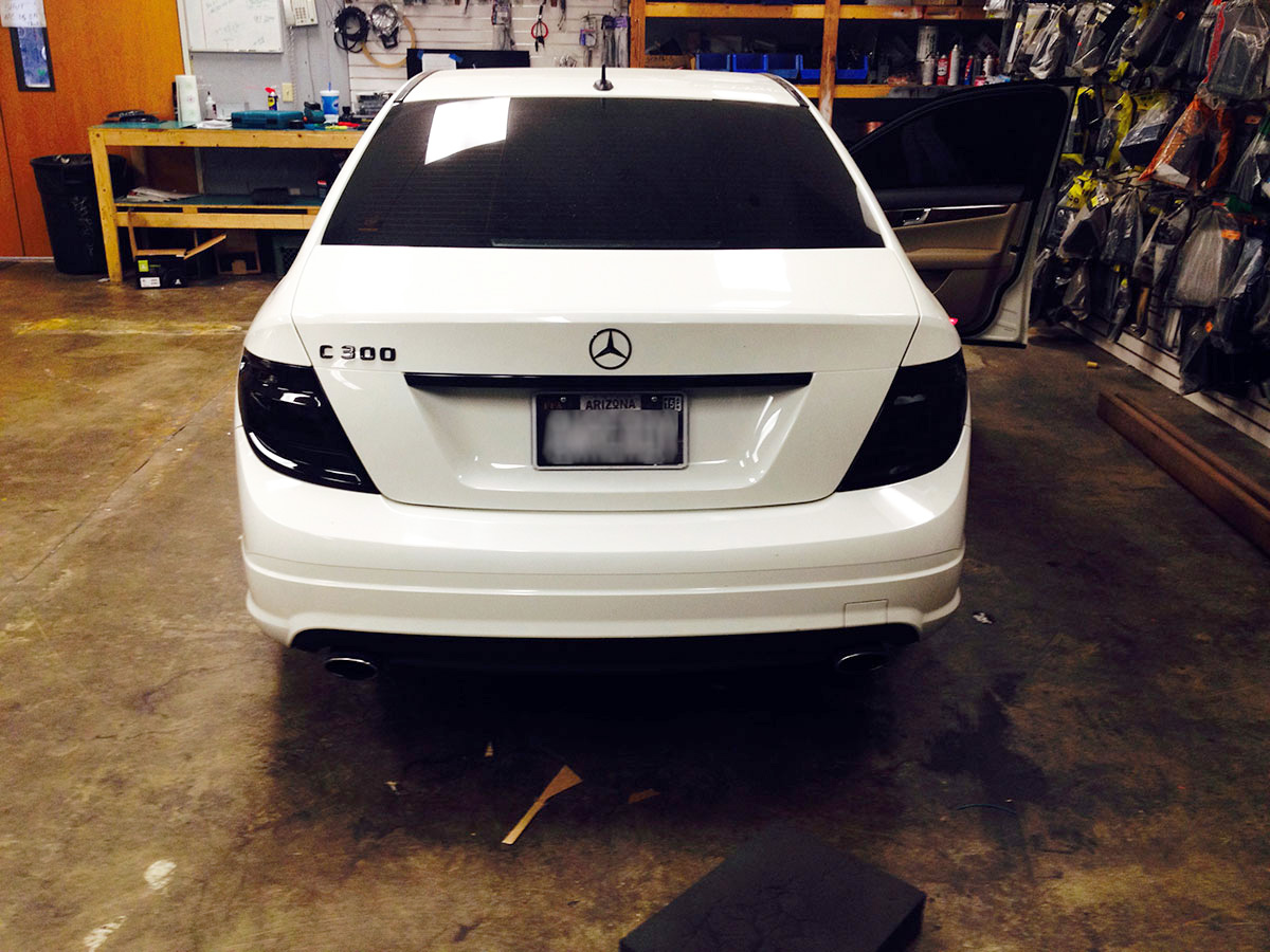 Rear view of Mercedes C300 inside installation bay at Sounds Good To Me Tempe Arizona Rear view of Mercedes C300 inside installation bay at Sounds Good To Me Tempe Arizona