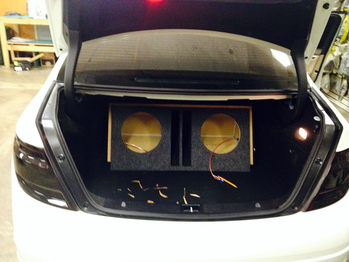 Custom dual subwoofer enclosure test fit inside Mercedes C300 trunk before installation Custom dual subwoofer enclosure test fit inside Mercedes C300 trunk before installation