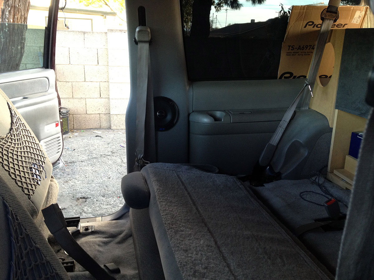 speaker installed in rear side panel of SUV interior during car audio upgrade speaker installed in rear side panel of SUV interior during car audio upgrade